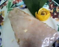 Bolo de laranja com cobertura açucarada