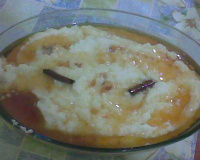 Arroz com leite com calda de pudim