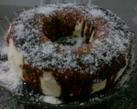 Pudim de coco com cobertura de chocolate