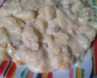 Nhoque de batata ao molho de cenouras e presunto