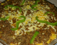 Polenta recheada de carne moída e queijo