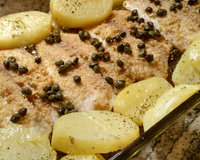 Filé de peixe na farofa ao molho de alcaparras