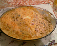 Macarrão ao molho de queijos e champignon