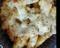 Linguiças recheadas e assadas com batatas