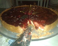 Cheesecake com calda de frutas vermelhas