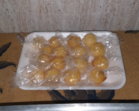 Bala de coco caramelizada (bala baiana ou bala de ovo)