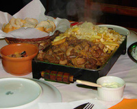 Picanha na chapa com mandioca na manteiga e mussarela