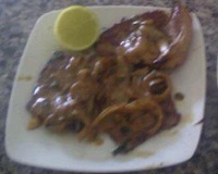 Bisteca de porco feita no taxo