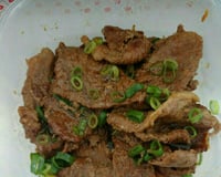 Carne na panela de pressão com cebola