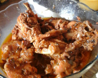 Galinha caipira ao molho de laranja