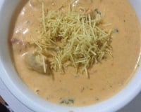 Estrogonofe de frango com creme de milho