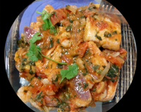 Filé de merluza ao molho de camarão