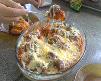 Almôndegas gratinadas com purê de batatas