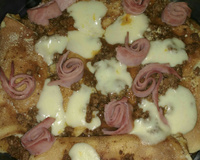 Panquecas com recheio de carne moída e acelga ao molho de tomate