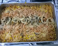 Espaguete com frutos do mar gratinado