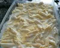 Macarrão ao molho de queijos e champignon