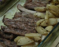 Costela de porco assada com batatas