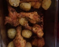 Coxa de frango assada com batatas
