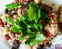 Risoto de filé mignon com tomate seco, rúcula e muzarela de búfala
