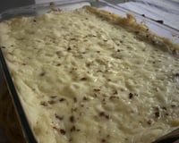 Escondidinho de carne de sol com batata e creme com requeijão.