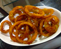 Anéis de cebola temperados