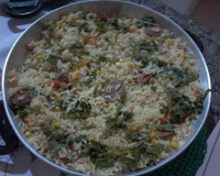 Arroz com calabresa, bacon e carne de sol