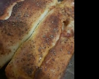 Pizza enrolada com recheio misto