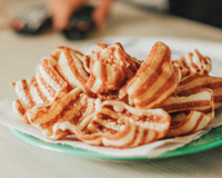 Pele listrada de pipoqueiro: aprenda a receita deliciosa do famoso petisco à pururuca