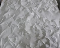 Cobertura de emulsificante