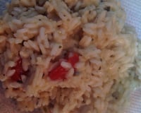 Risoto de queijo com tomate cereja e manjericão