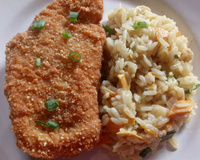 Risoto de tucumã e castanha do Brasil com pirarucu empanado