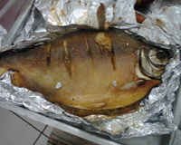 Pacu recheado com farofa molhada