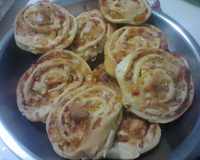 Caracóis de presunto e queijo