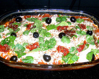 Lasanha de tomate seco e rúcula