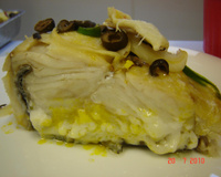 Lombo de bacalhau ao azeite de dendê e leite de coco