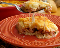 Suflê de batata com presunto e queijo