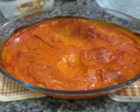 Filé de merluza rápida, com requeijão e molho de tomate