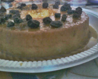 Pudim de pão com coco queimado e passas