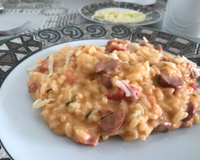 Risoto de calabresa com tomates pelados