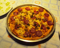 Pizza de forno ou churrasqueira