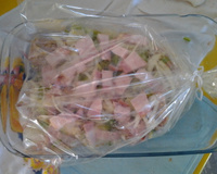 Coxa e sobre coxa assada no saco de polyéster