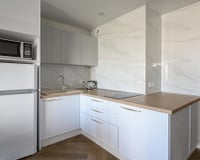Designers de interiores concordam: "Eletrodomésticos brancos envelhecem tão mal quanto cozinhas coloridas."
