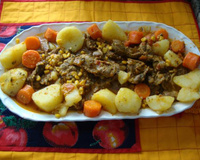 Moelas com batatas, cenouras e milho verde