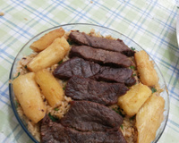 Baião de dois com carne seca e mandioca