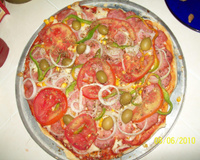 Pizza de forno ou churrasqueira