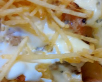 Picadinho de frango com requeijão ao forno