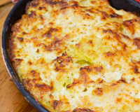 O bacalhau cremoso gratinado que faço todo Natal: a receita de família com batatas que todo mundo ama