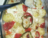 Filé de tilápia ao molho branco e legumes