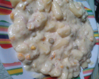 Nhoque de batata ao molho de cenouras e presunto