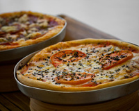 Pizza de forno ou churrasqueira